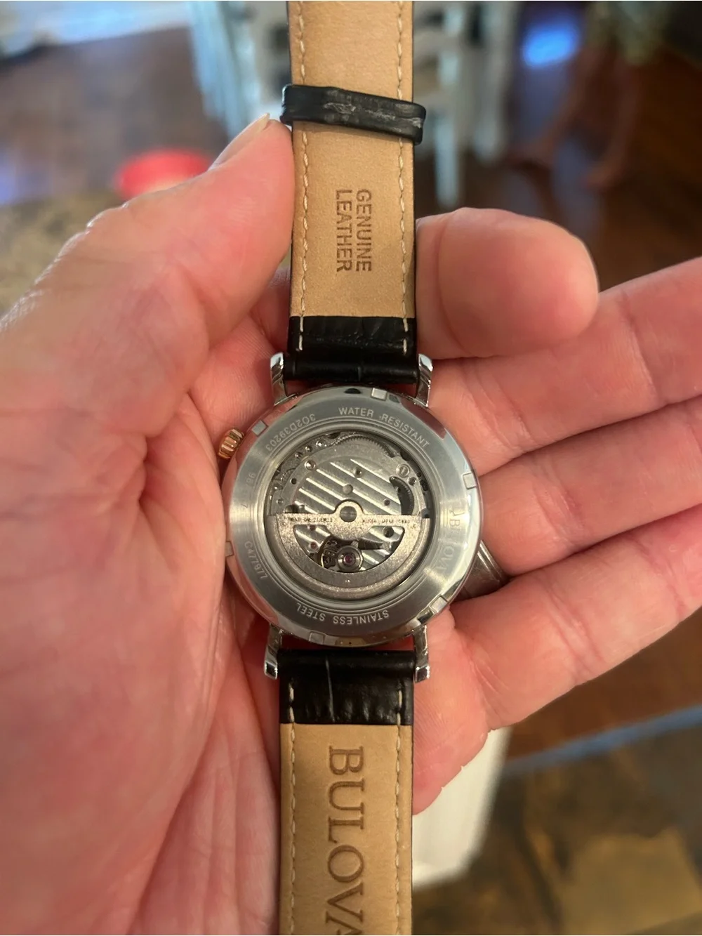 Bulova Black Dial Watch with Rose-Gold Accents and Black Leather Strap.